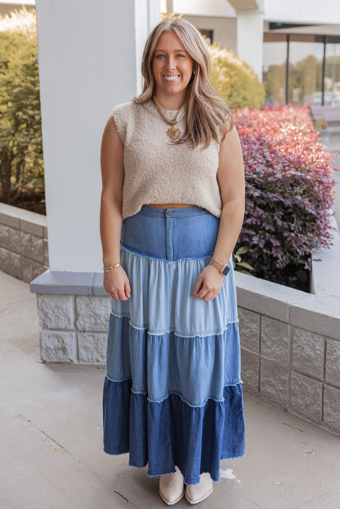 Women's ruffle tiered denim maxi skirt in multi shades of blue, perfect for fall
