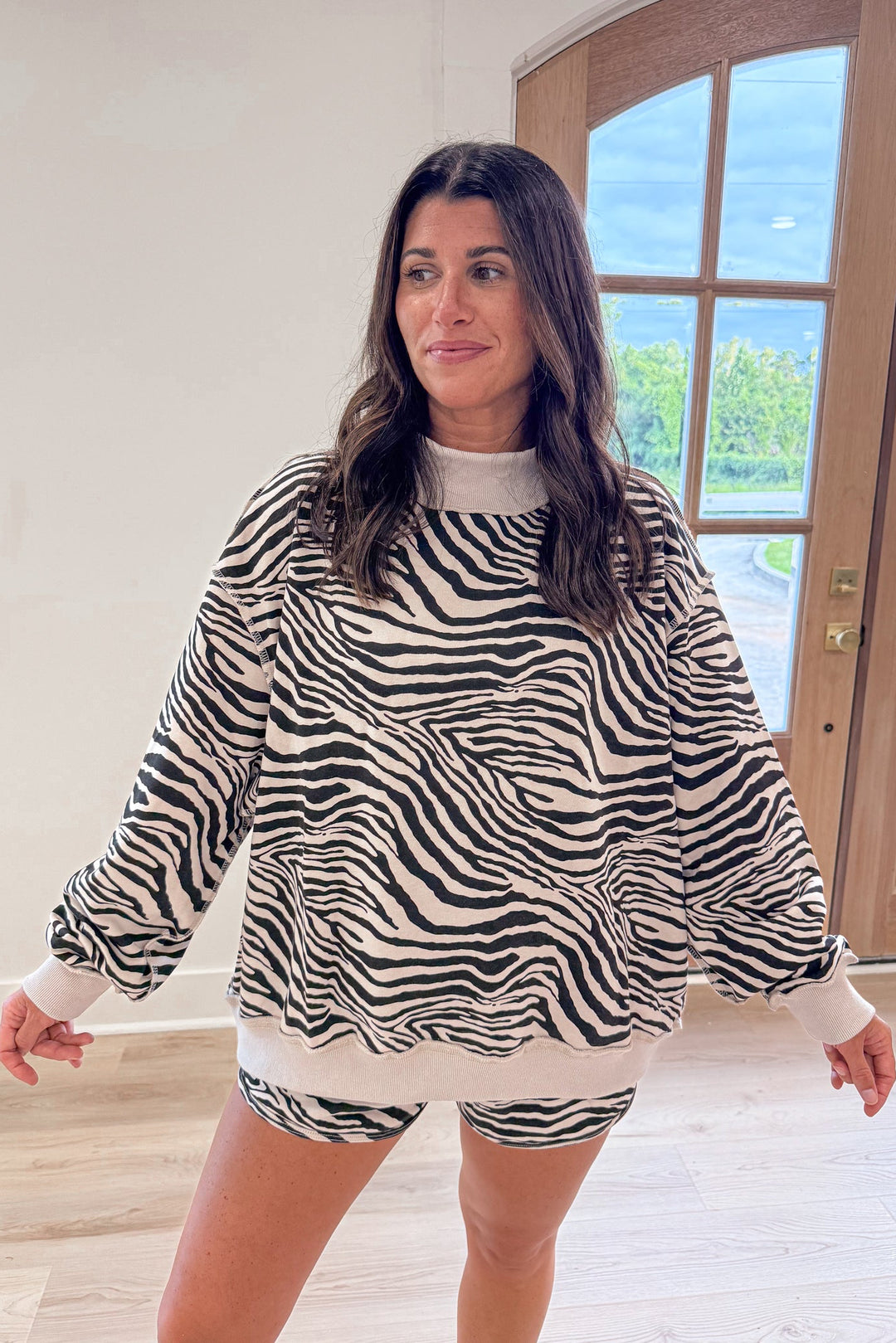 black white zebra print oversized mock neck pullover 