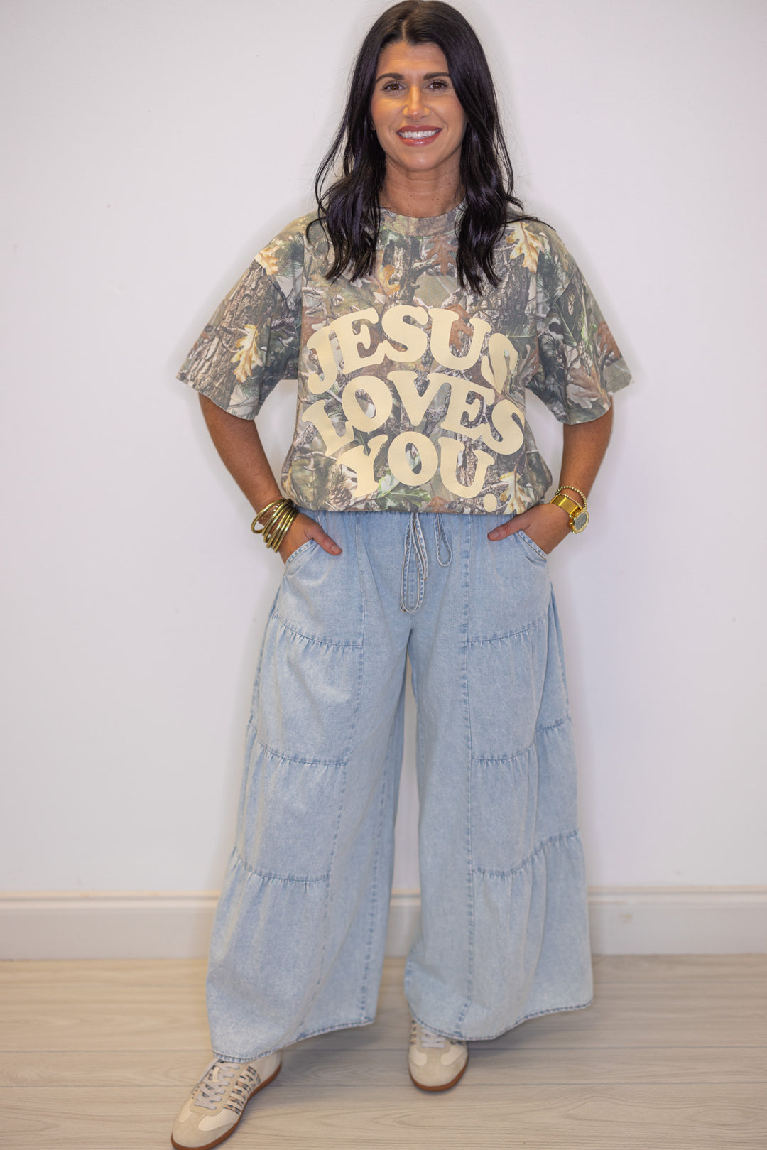 Jesus Loves You women's heavyweight oversized green camouflage t-shirt showing full view styled with an outfit