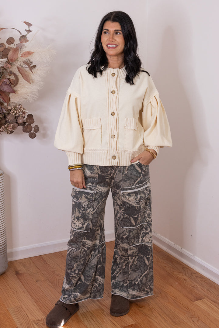 Women's ecru terry knit button front cardigan with textured ribbed knit trim by Entro, perfect for casual or dressy outfits