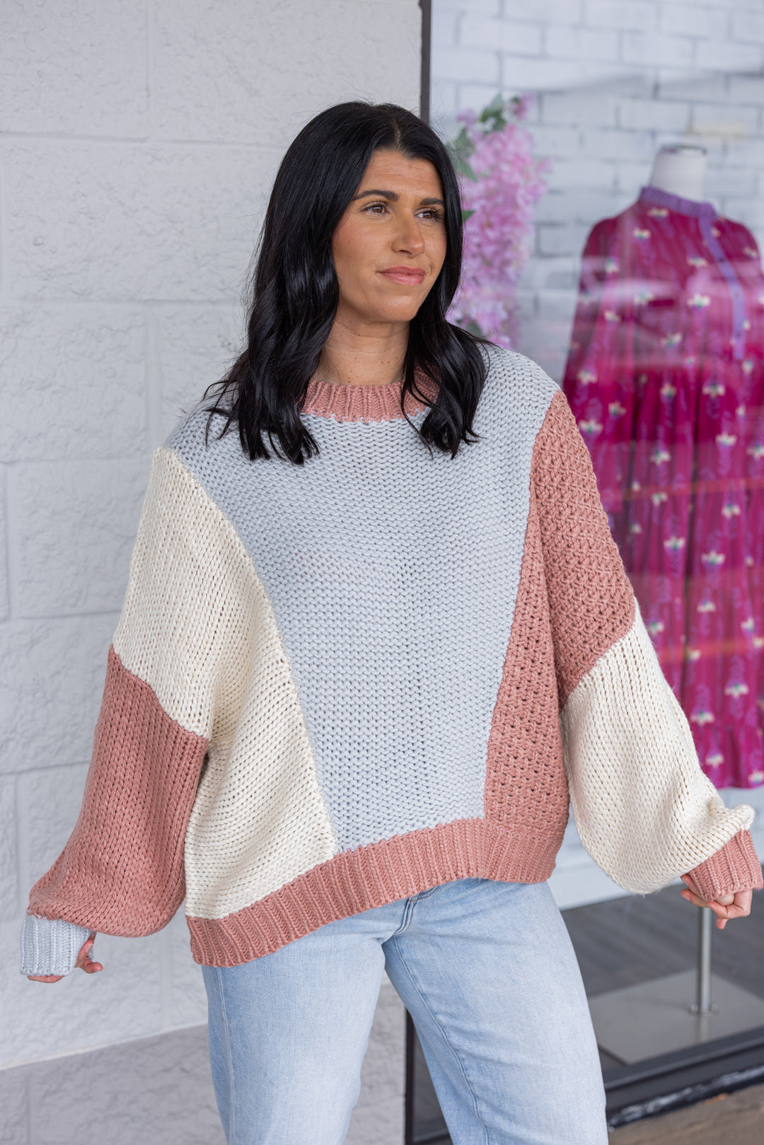 Women's dusty rose and light blue knit colorblock sweater by Wishlist showing up close slight side view