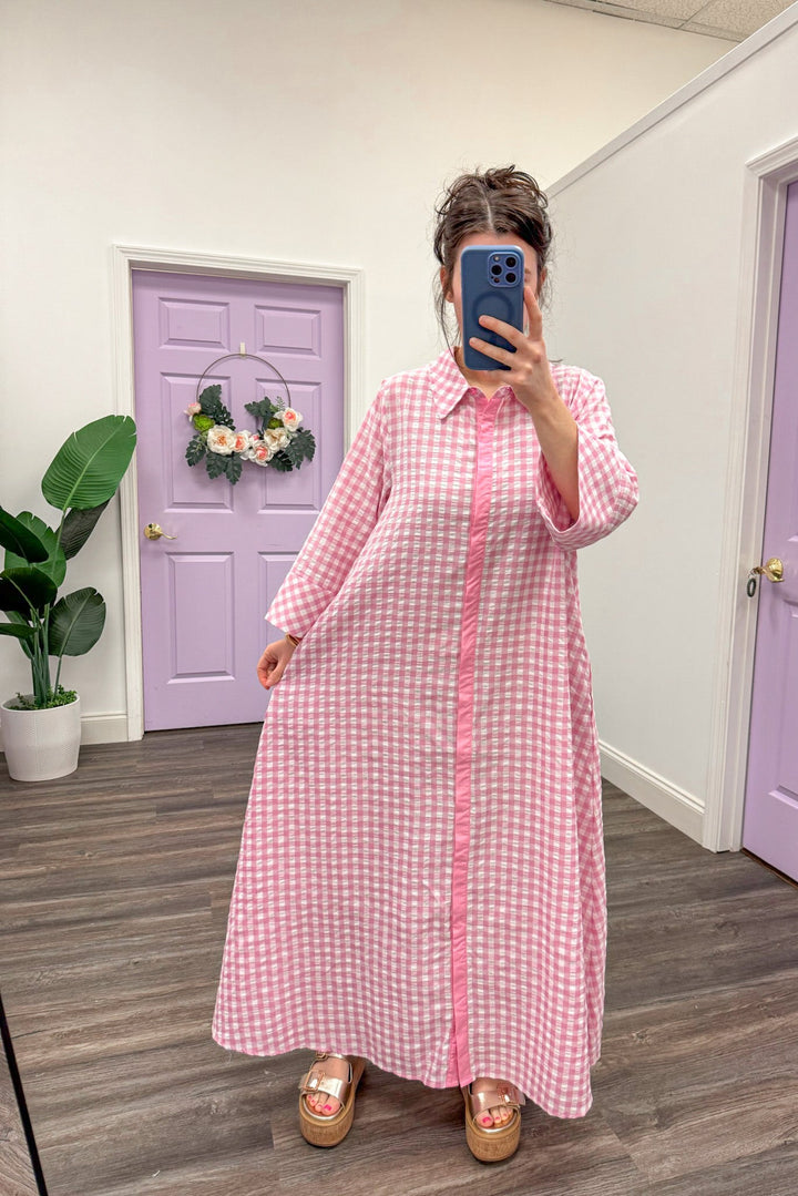 Women's pink and white gingham midi dress with relaxed silouhette by Entro
