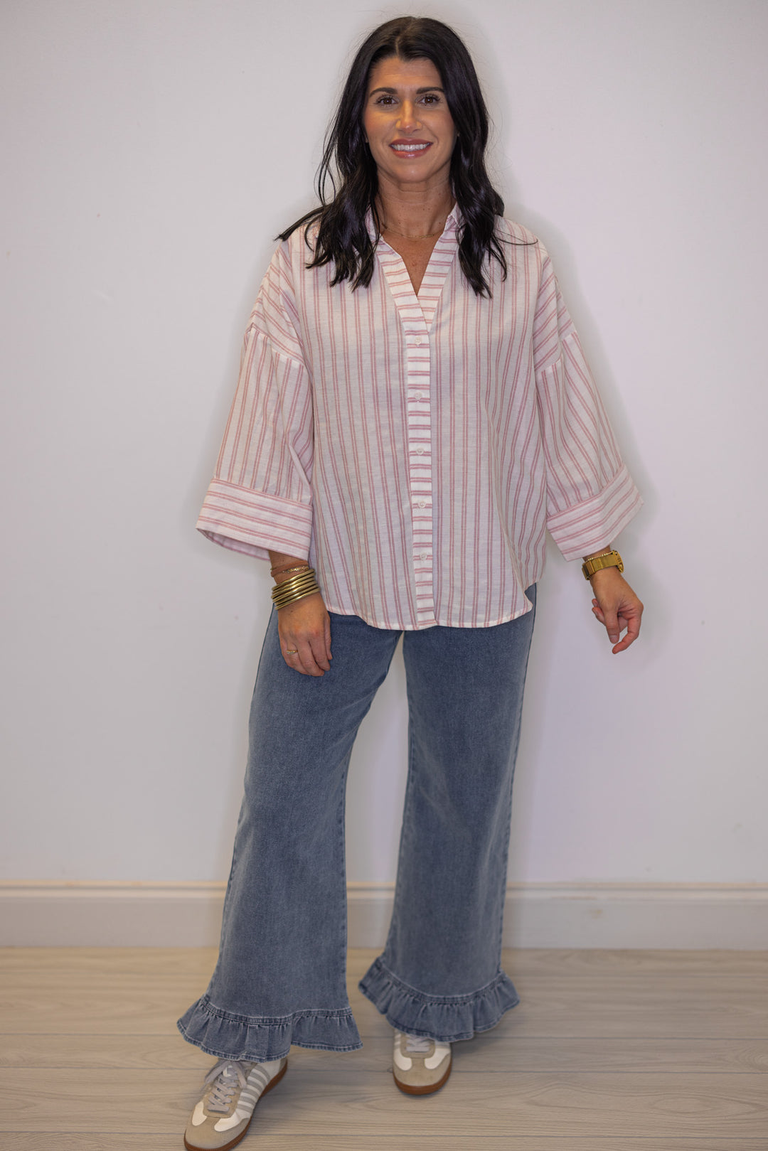 Women's pink and cream striped button down top, great for teachers