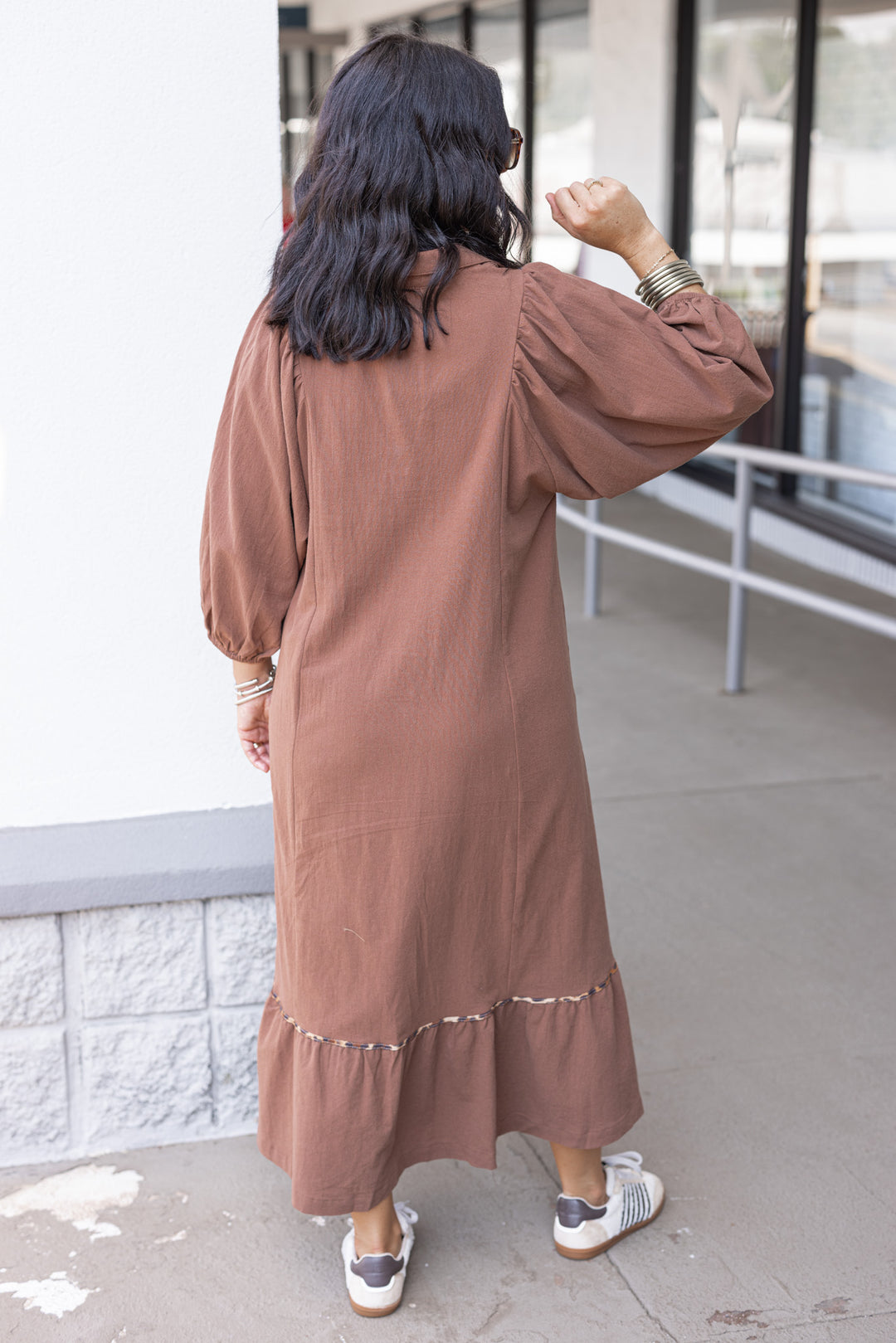 Women's brown midi dress with smocked bodice and leopard print trim by Umgee showing full back view