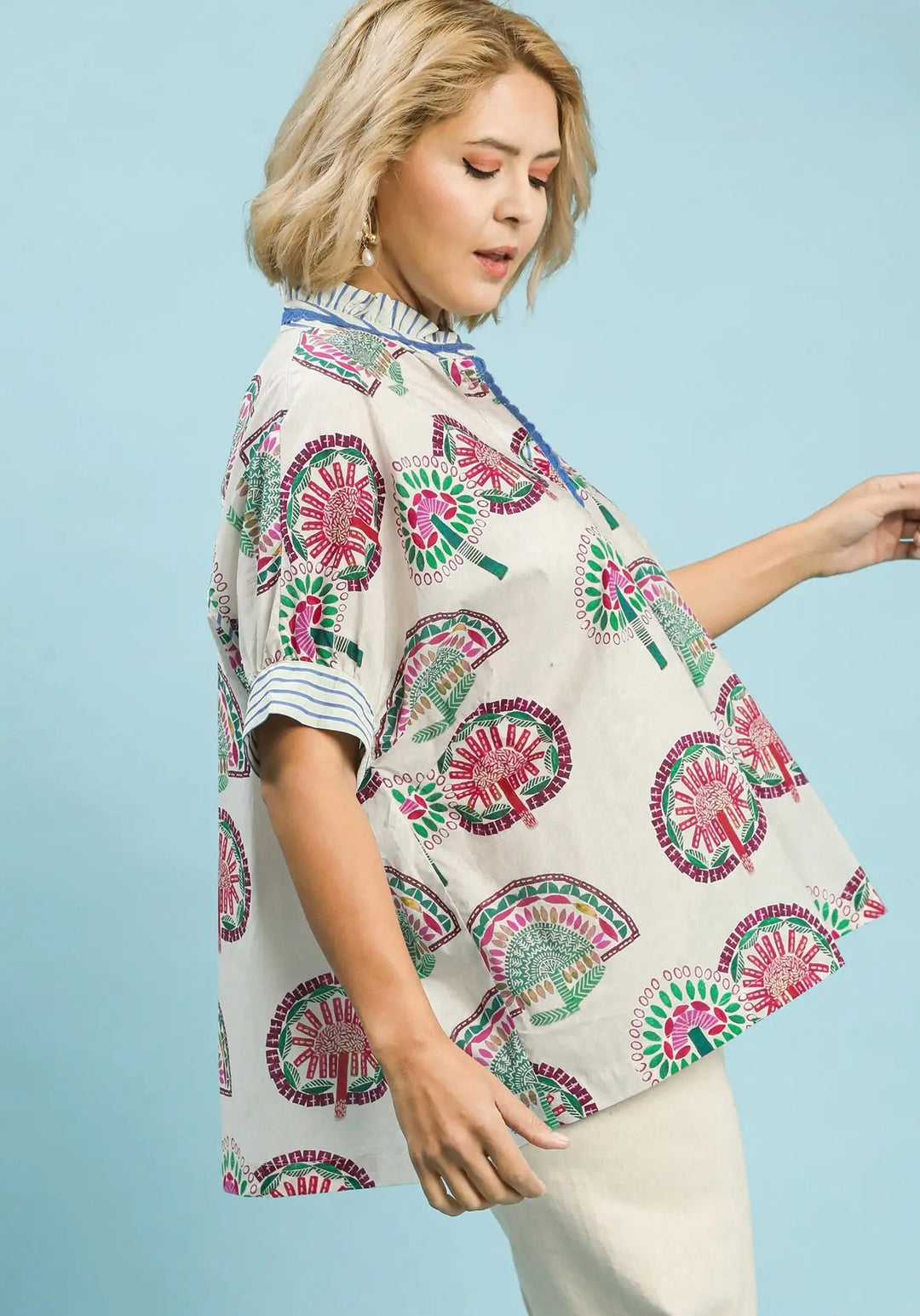 Umgee button front cream top with multicolor abstract print and dolman sleeves in plus size 