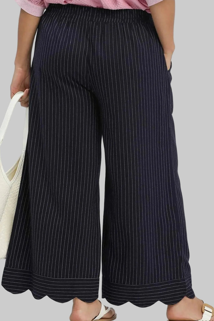 Umgee plus size navy and cream pinstripe linen pants with scalloped hem and a flattering fit