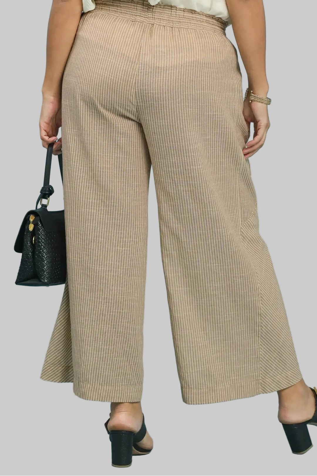 Umgee plus size tan and cream striped wide leg linen pants with frayed seam details in a flattering fit