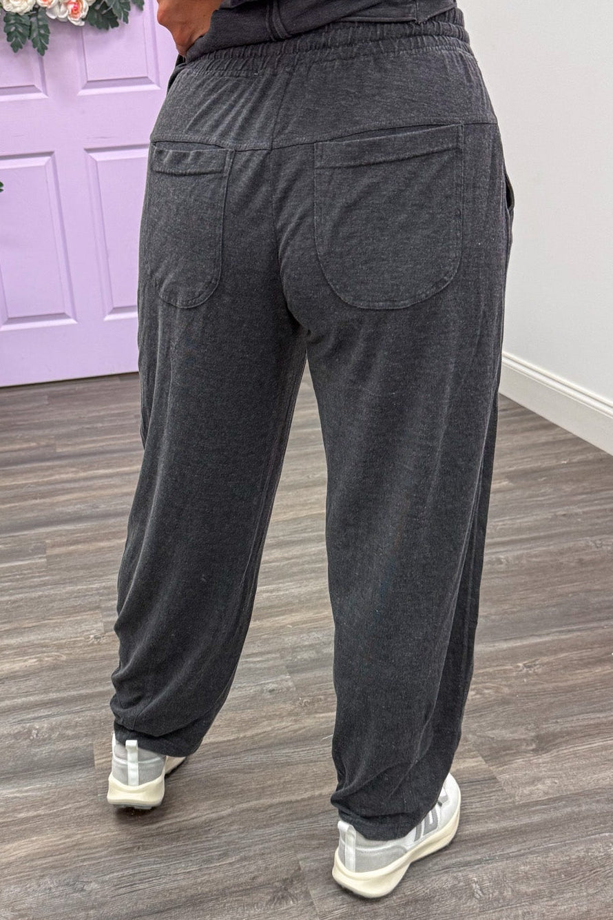 solid mineral washed black barrel leg semi-cropped knit loungewear pants with back patch pockets