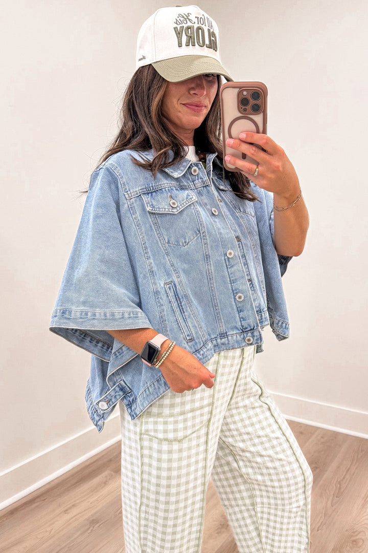 solid washed blue denim button front short drape sleeve poncho style jacket with open sides