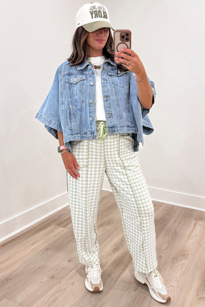 solid washed blue denim button front short drape sleeve poncho style jacket with front chest pockets