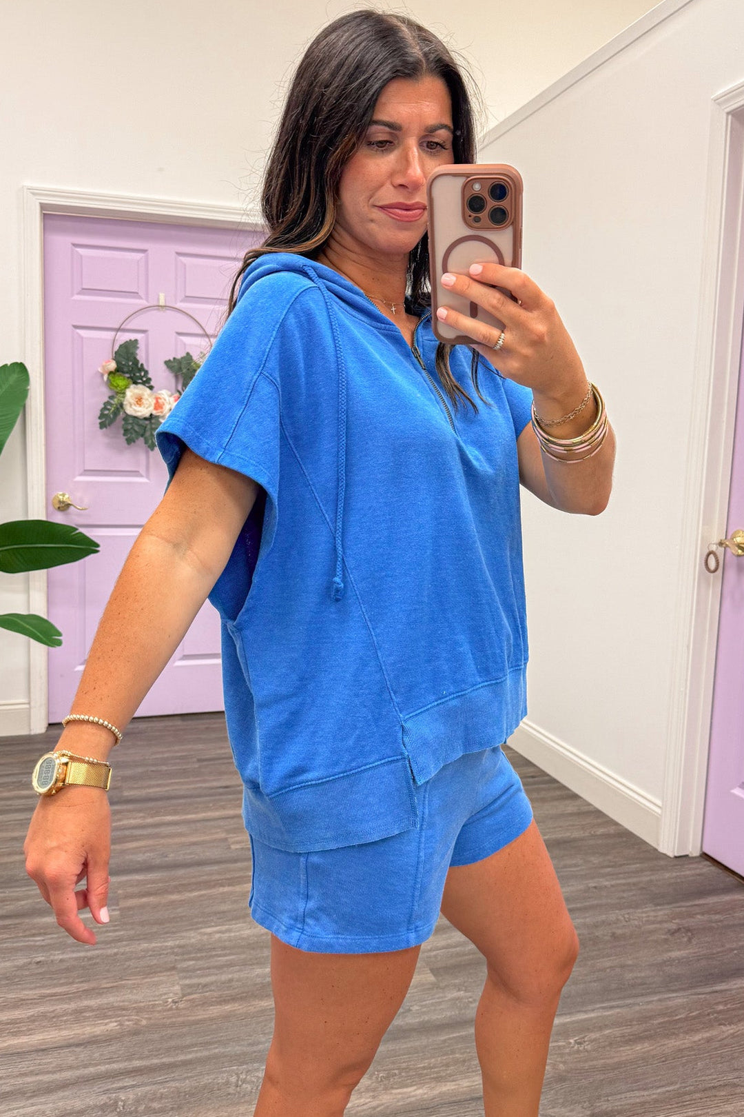 mineral washed cobalt blue quarter zip asymmetrical hem hooded pullover top