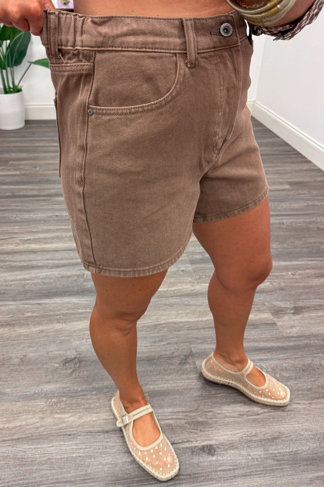 washed chocolate brown button fly closure wide leg denim shorts with elastic waistband in back