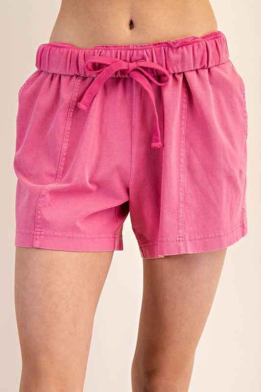 Women's elastic waist knit shorts in mineral washed french pink by Rae Mode