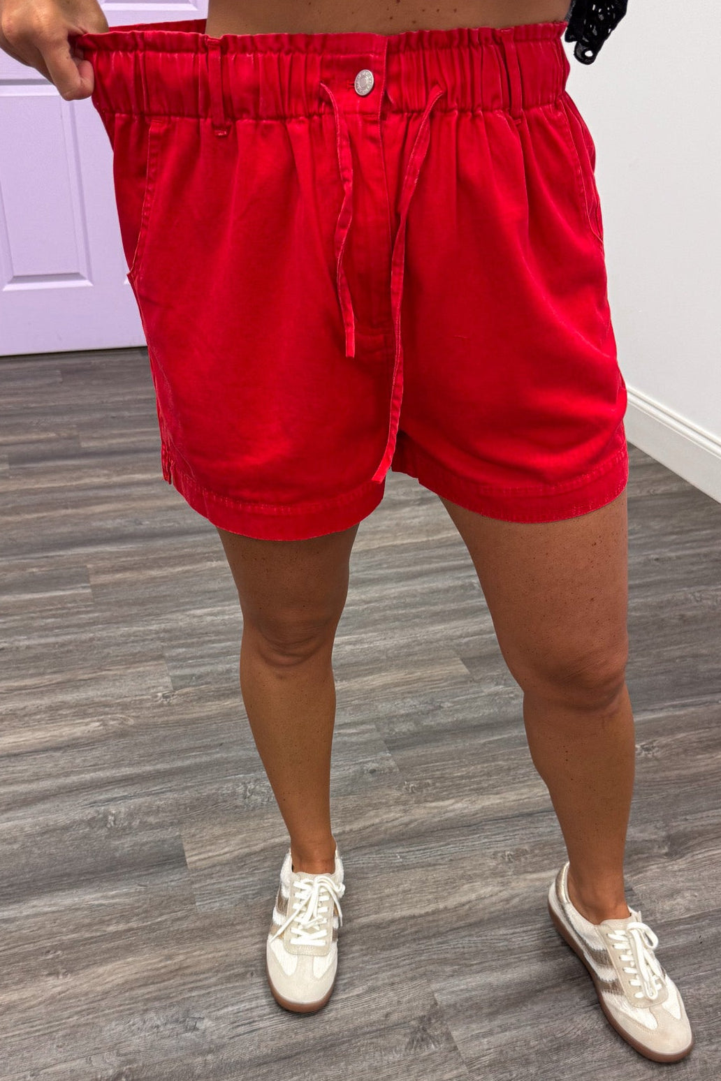 solid washed red denim paperbag waist elastic waistband wide leg shorts