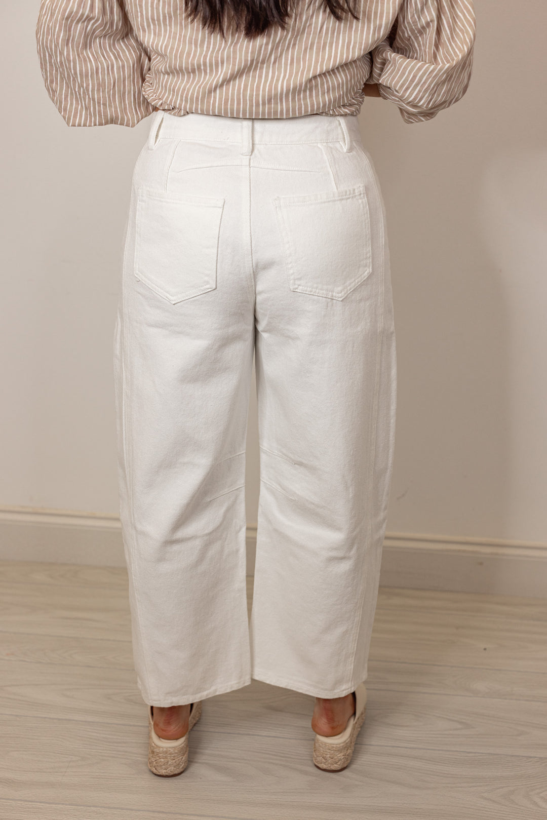white narrow barrel leg denim pants