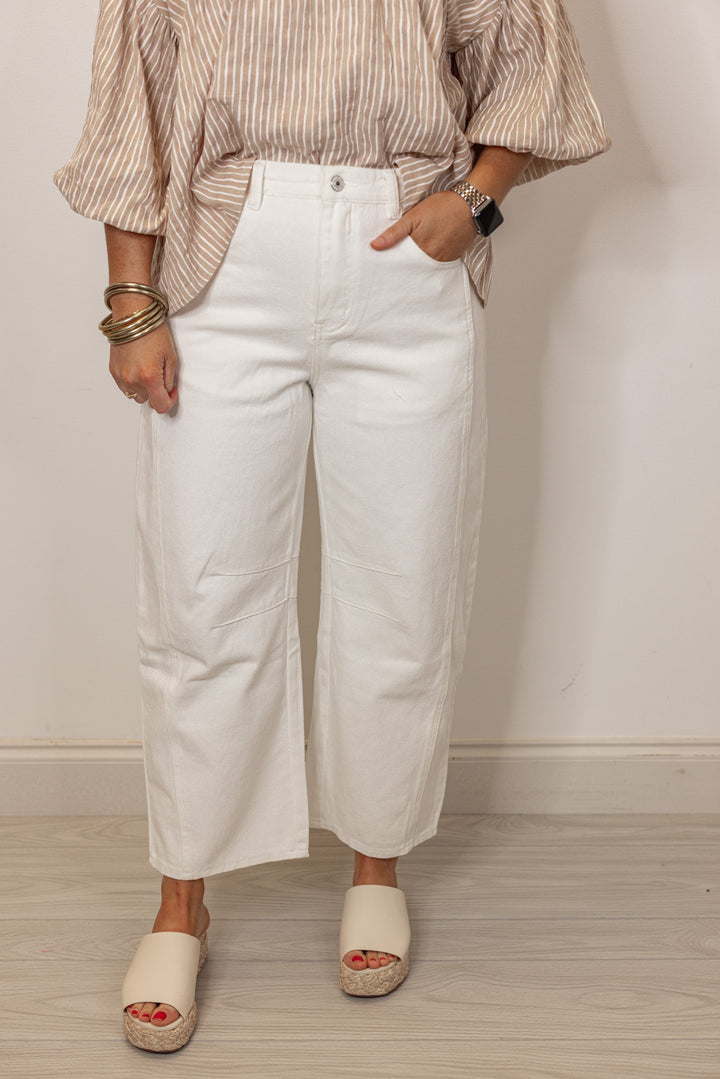 white narrow barrel leg denim pants