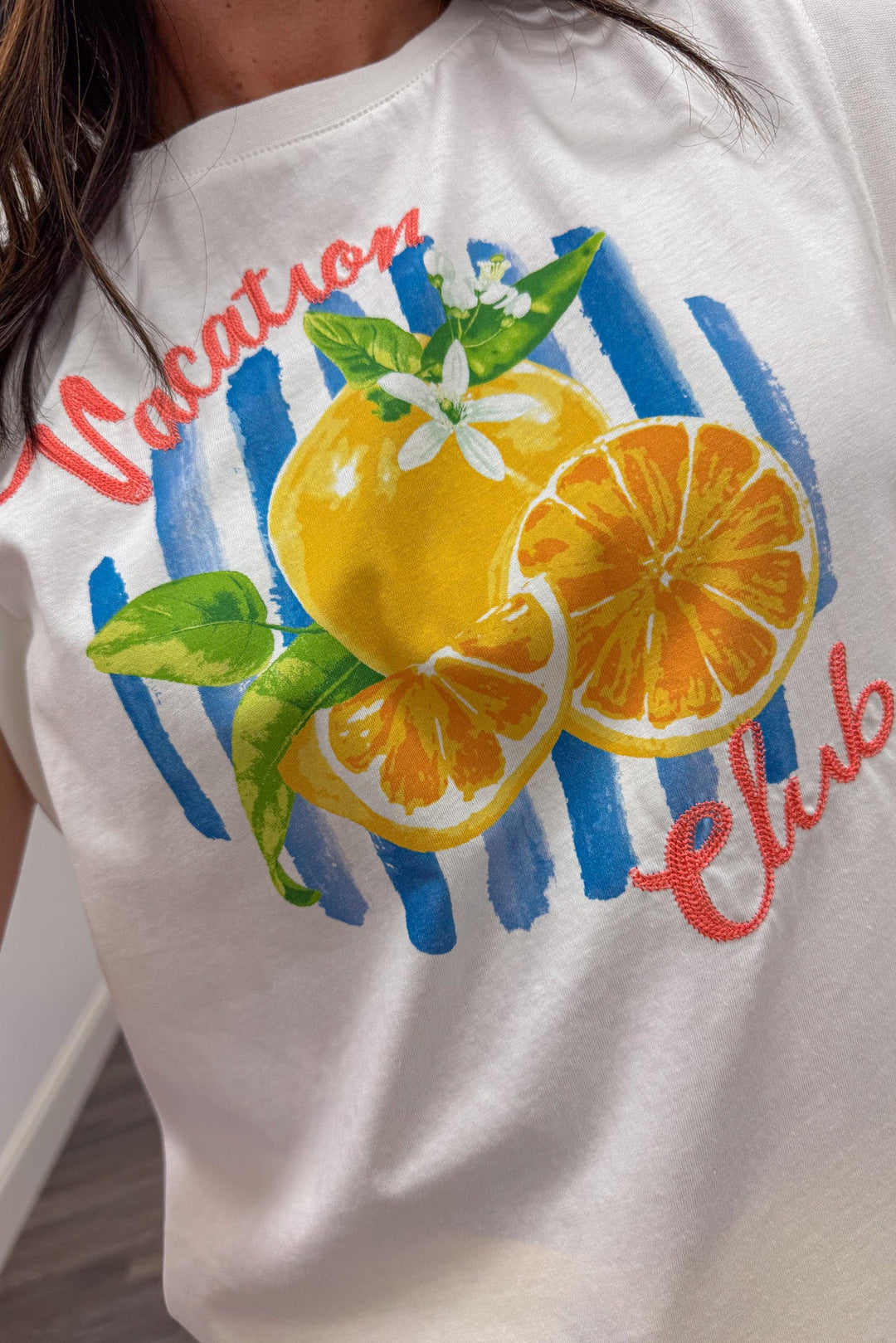 vacation club yellow orange red and blue citrus graphic print white top