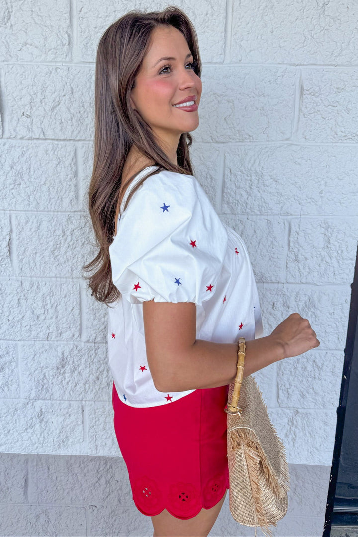 red and blue embroidered star print white relaxed silhouette babydoll top