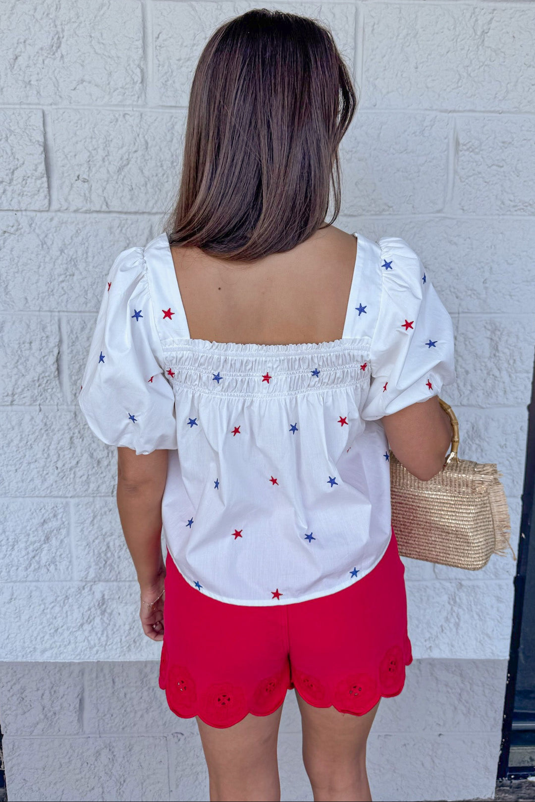 red and blue embroidered star print white smocked neckline babydoll top