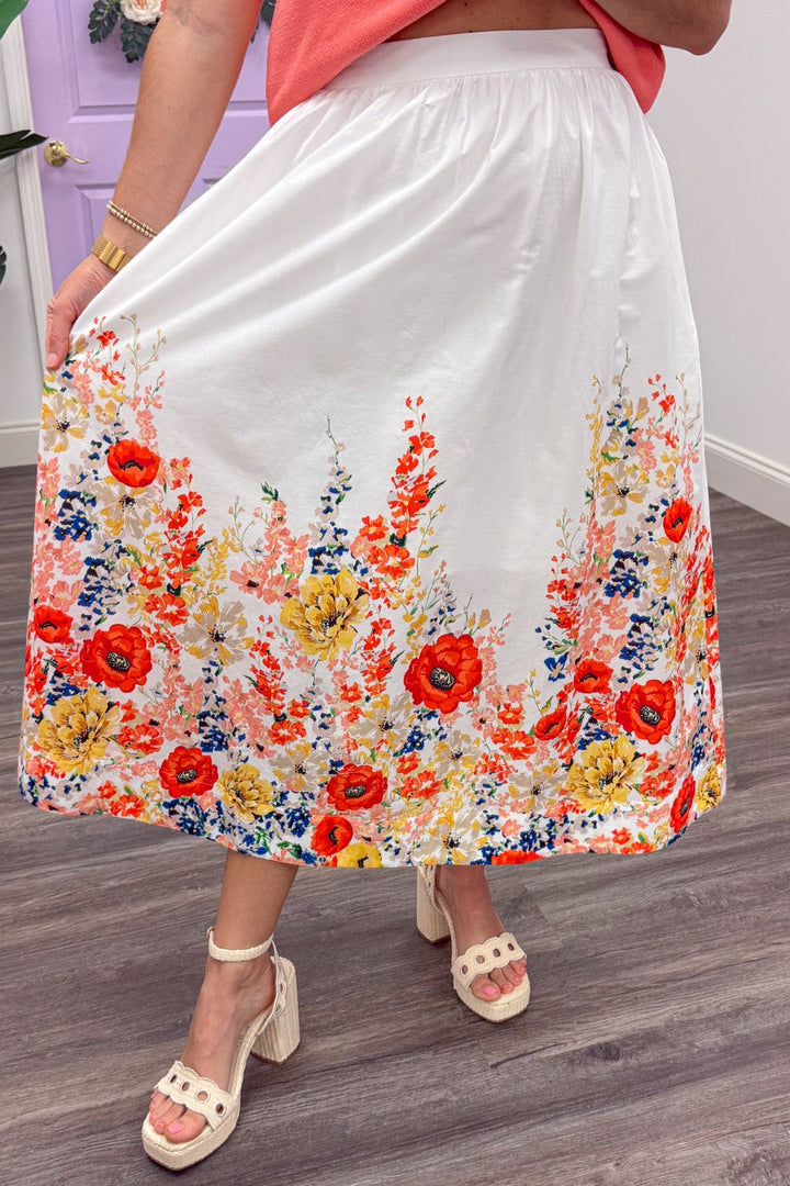 colorful floral print flowy pleated poplin material off white midi skirt