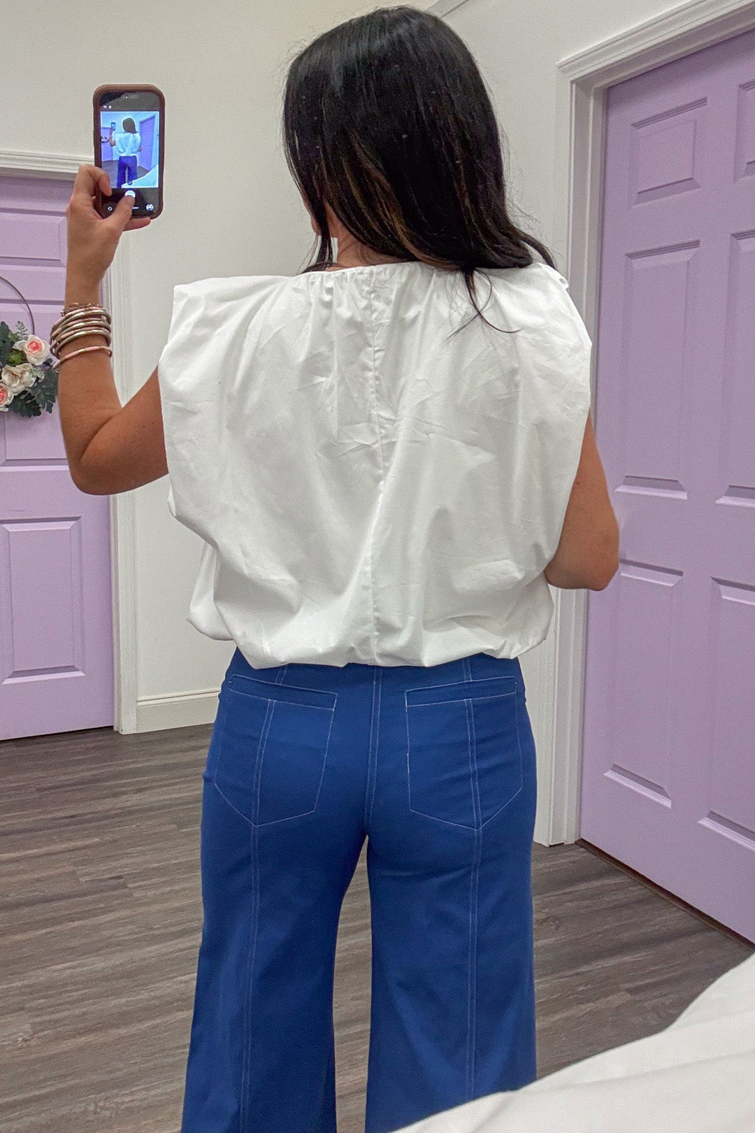 solid white v neckline flutter sleeve bubble hem cotton top