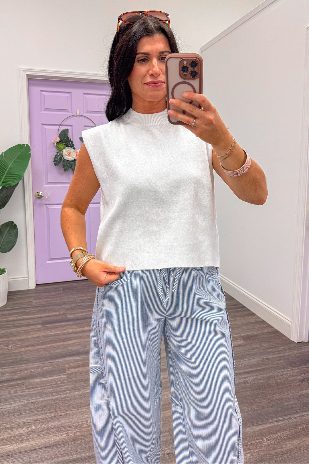 white knit sleeveless mock neck top