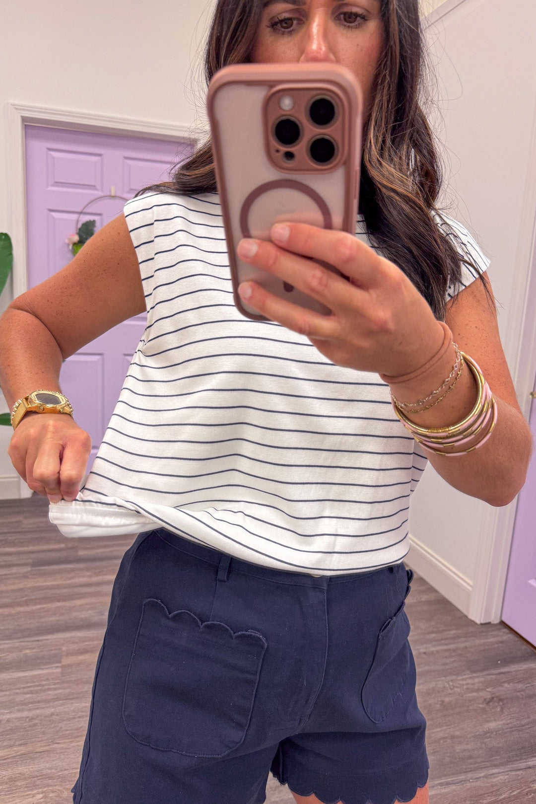 navy and white horizontal striped sleeveless bubble hem top