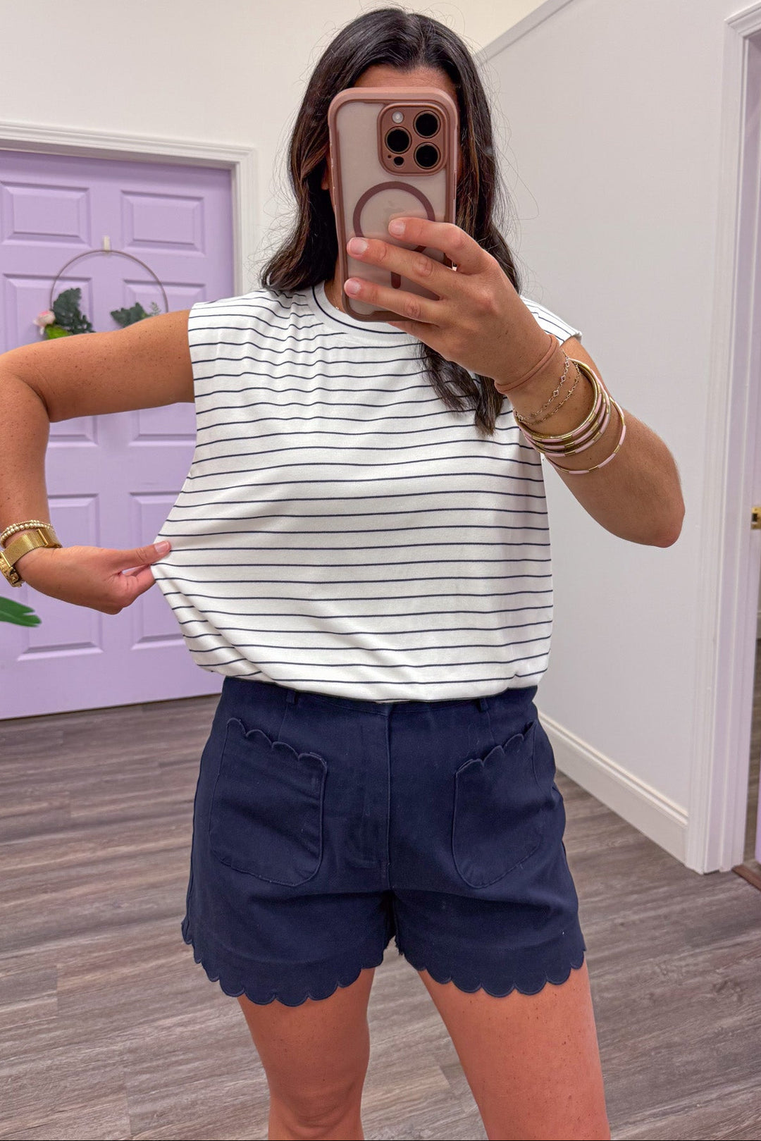 navy and white horizontal striped sleeveless semi-cropped top