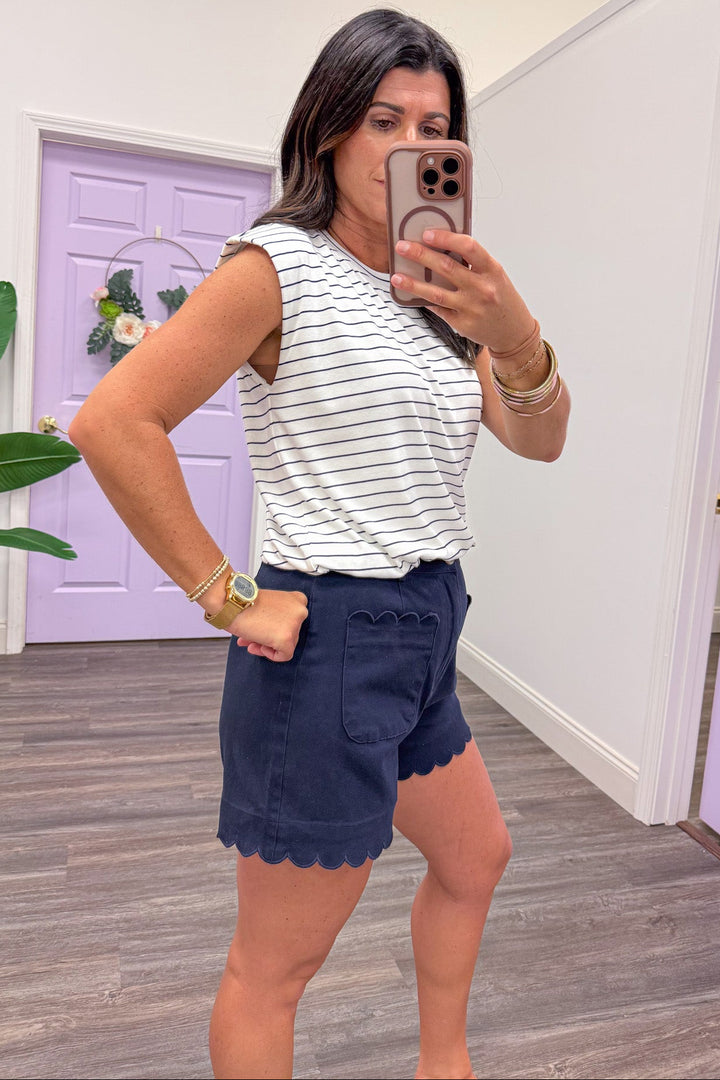 navy and white horizontal striped sleeveless crew neckline top
