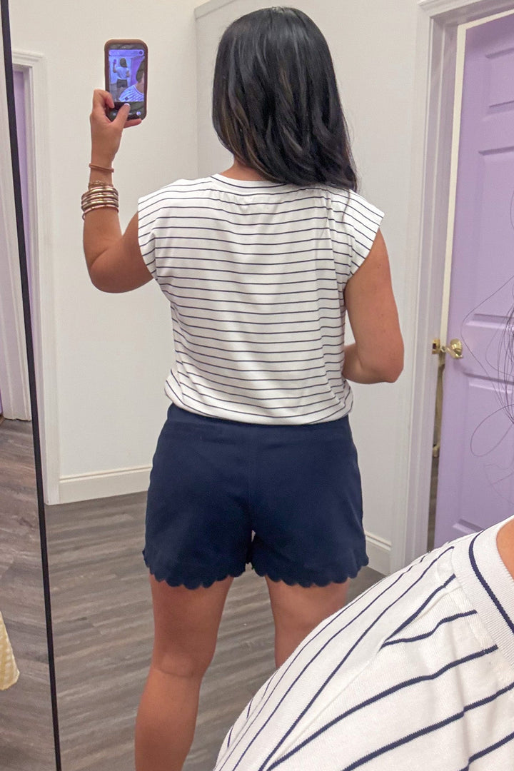 navy and white horizontal striped sleeveless relaxed silhouette top
