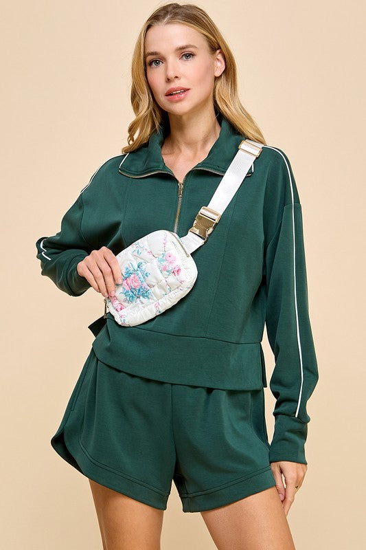Pretty Follies TCEC White quilted puffer crossbody/fanny pack with pink and light green floral print