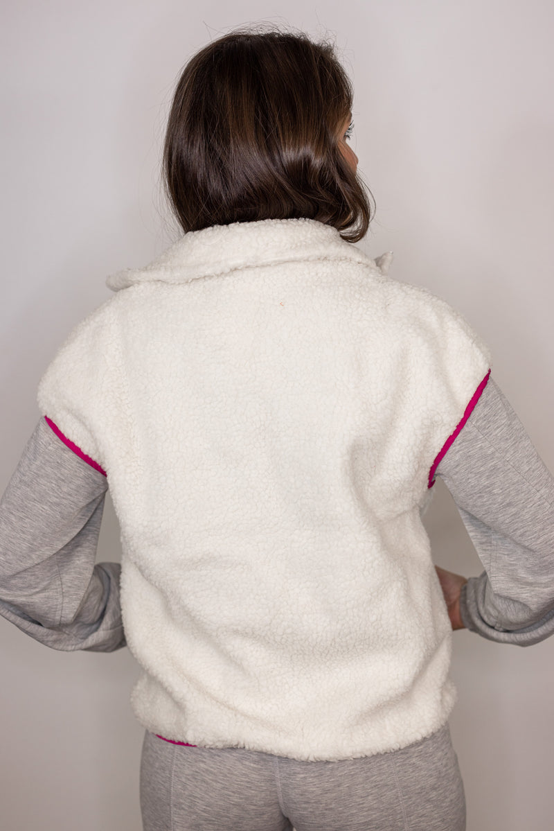 white pink trim sherpa vest