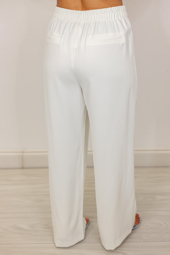 white pleated wide leg dress pants