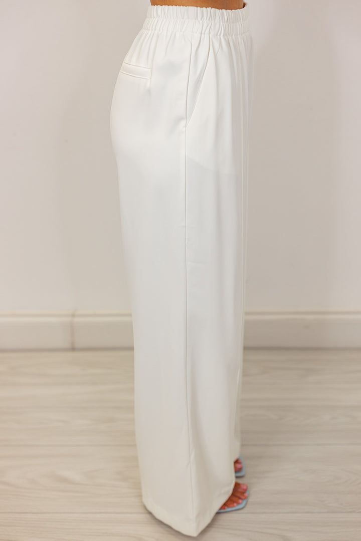 white pleated wide leg dress pants