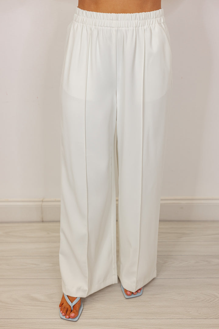 white pleated wide leg dress pants