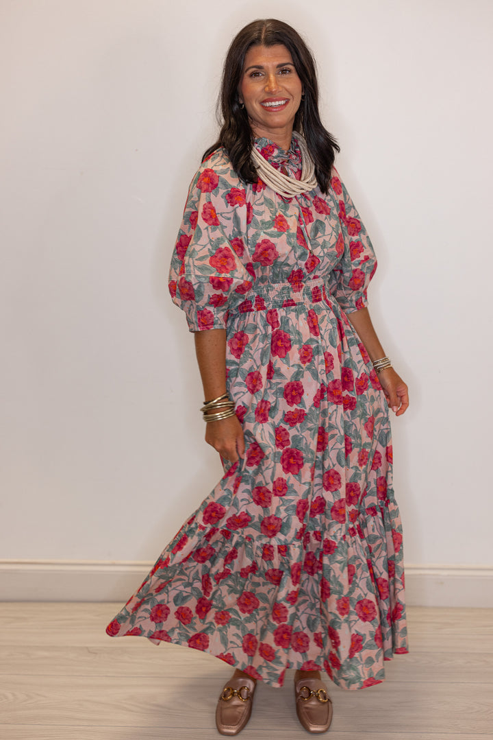 Women's pink and green floral maxi dress with puff sleeves and ruffle detail by Entro