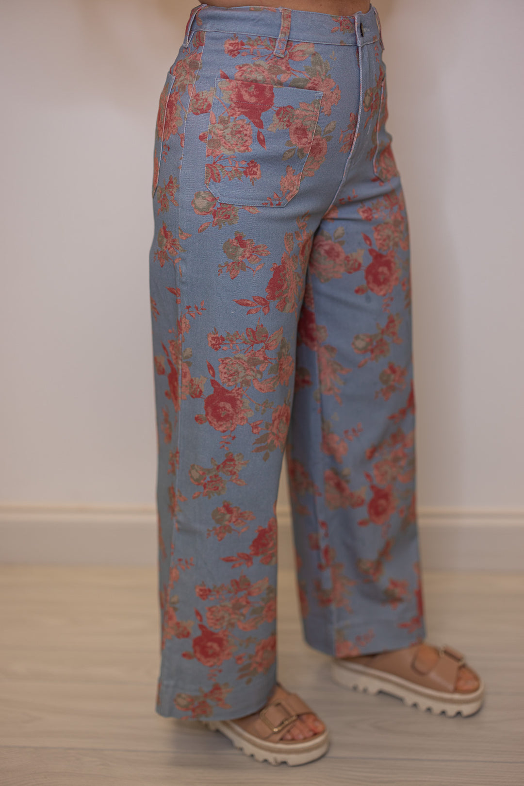 Women's blue twill floral print wide leg pants by Entro showing up close, slight side view
