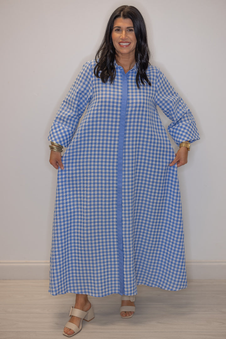 Women's blue and white gingham midi dress by Entro showing hidden button front down the dress