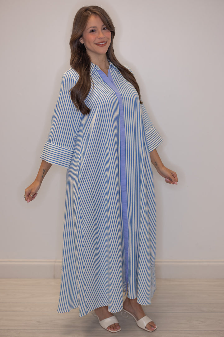 Women's striped blue maxi dress by Entro, perfect for Spring events
