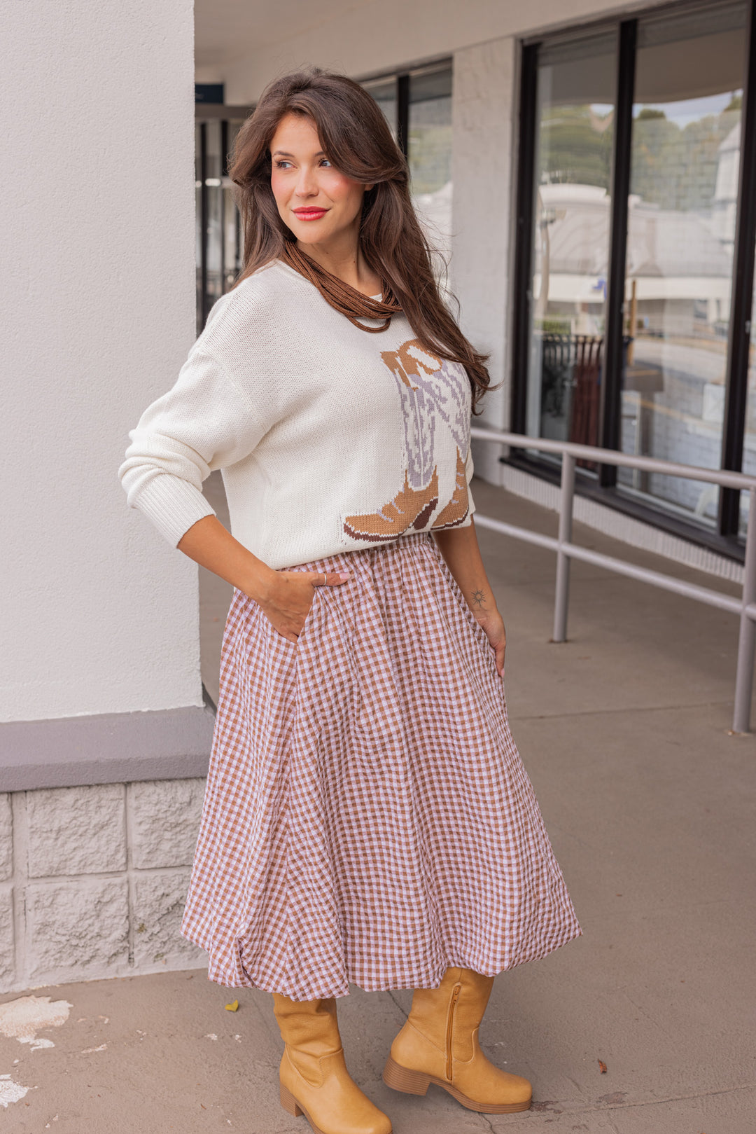 Women's caramel and white gingham textured midi skirt with bubble hem by Easel showing side view