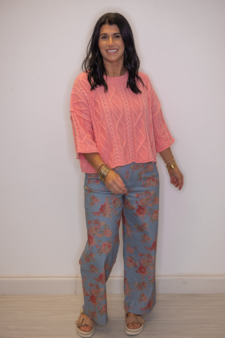 Women's coral pink cable knit cropped sweater by Entro, perfect for Spring