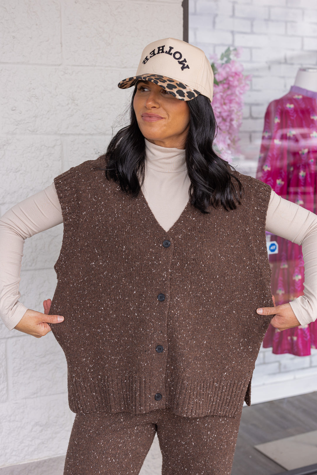 Women's chocolate brown button front sweater knit vest with ribbed trim by Mustard Seed showing relaxed fit