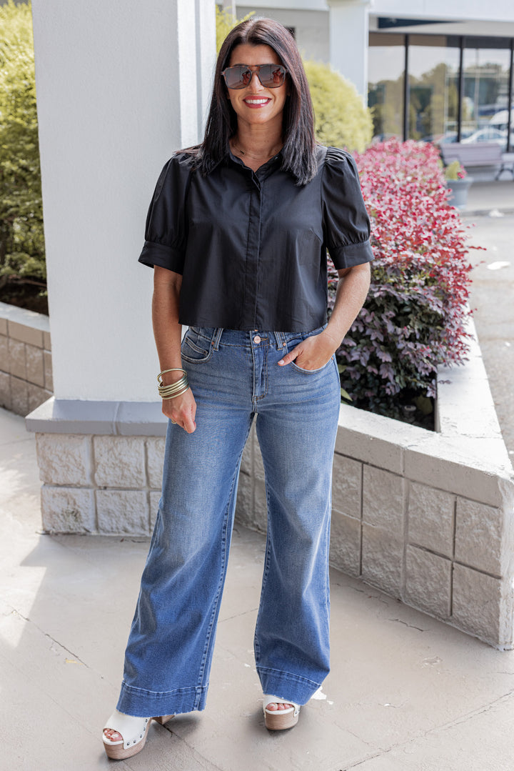 Women's black puff sleeve button front cropped top by Entro showing full front view