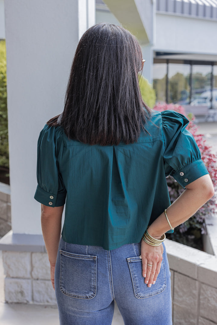 Women's hunter green puff sleeve button front cropped top by Entro showing up close back view