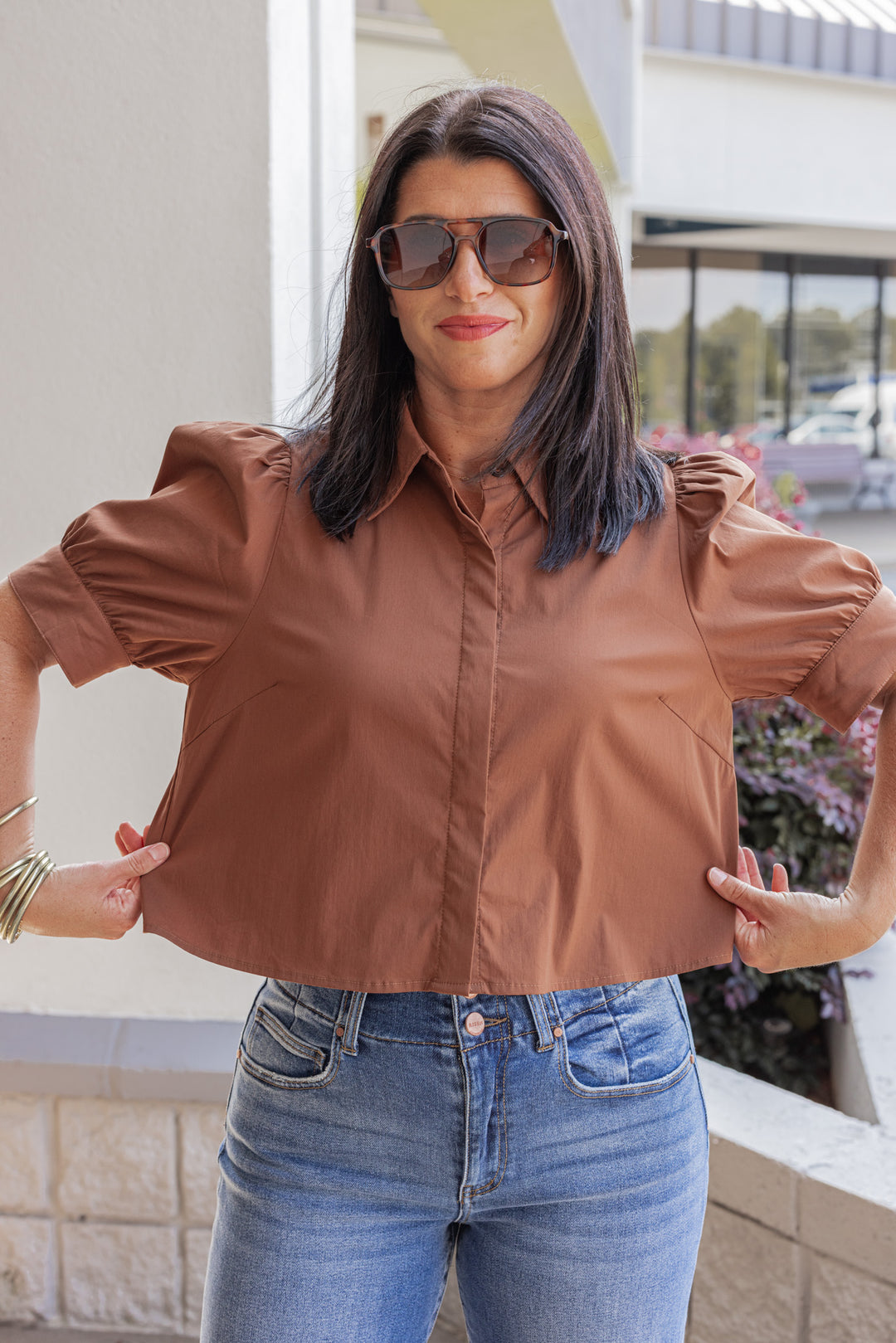 Women's caramel puff sleeve button front cropped top by Entro showing cropped length