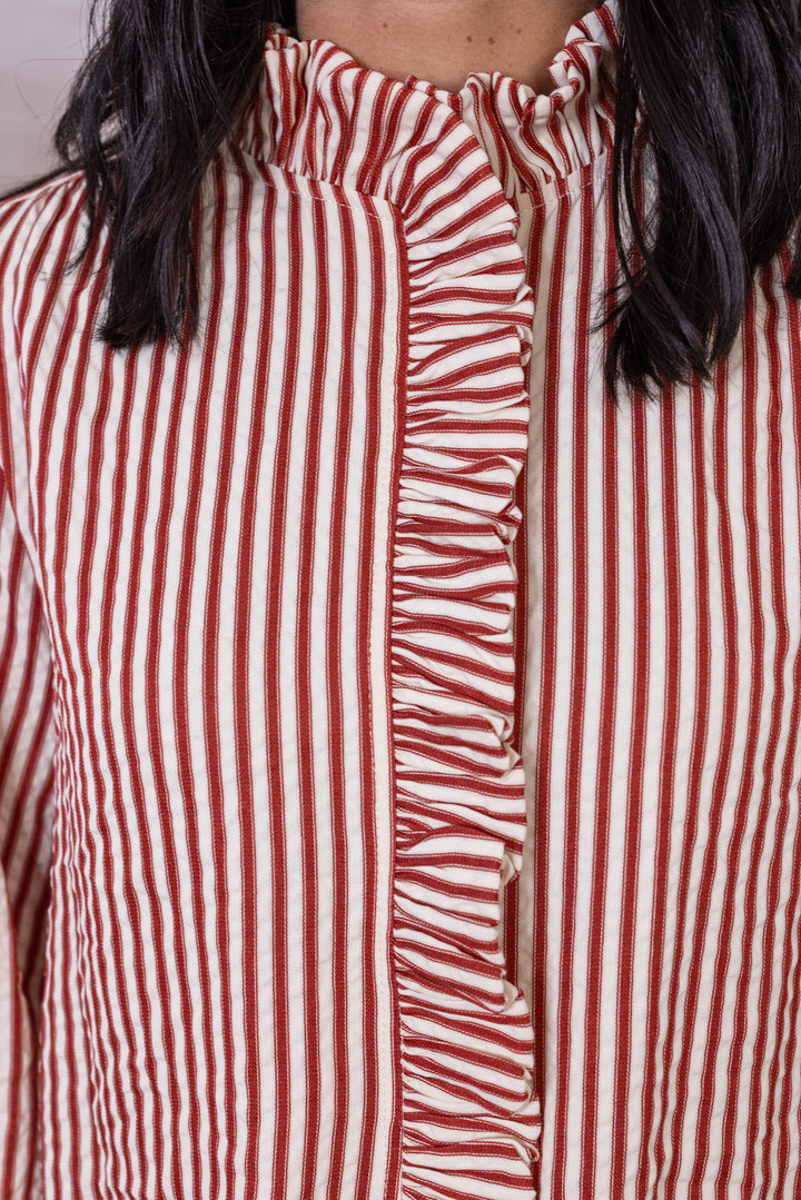 Women's red and cream striped button front top with ruffle trim details by &merci showing up close bodice view
