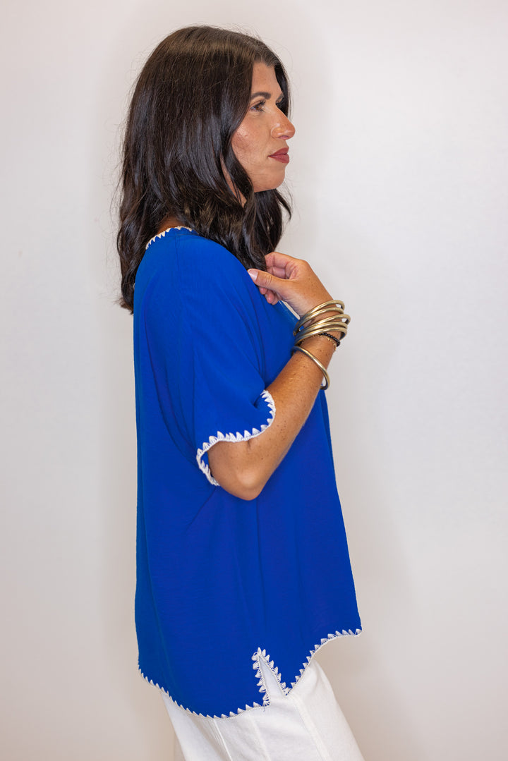 Royal blue lightweight crinkle top with embroidery stitching trim by Jodifl showing side view
