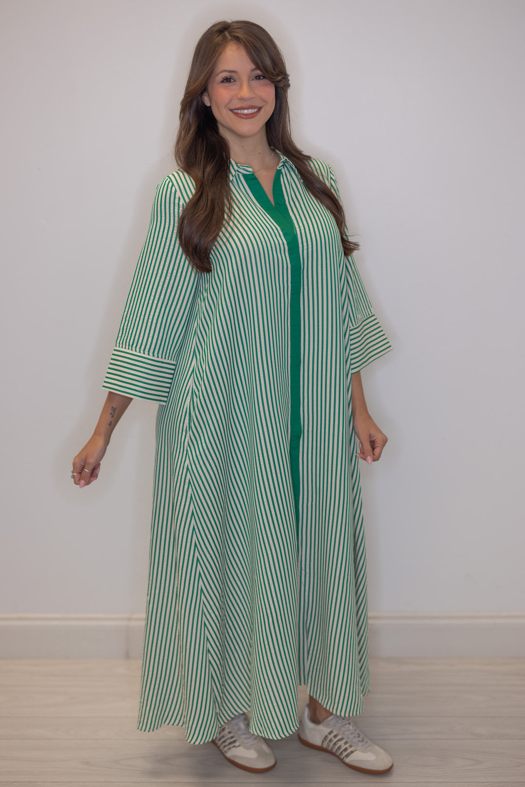 Women's striped green maxi dress by Entro, perfect for church