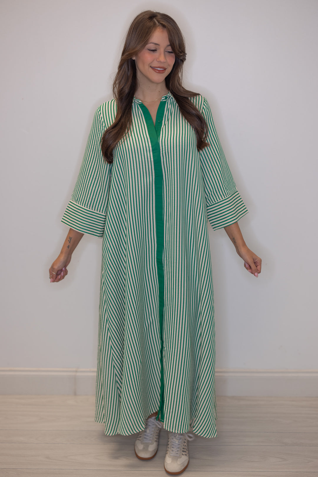 Women's striped green maxi dress by Entro, perfect for teachers
