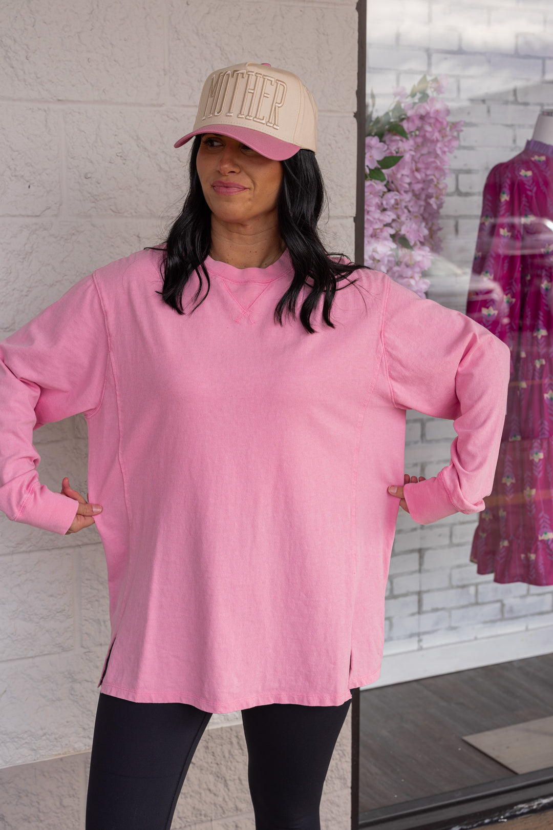 Women's mineral washed taffy pink long sleeve top by Hyfve showing true to size fit